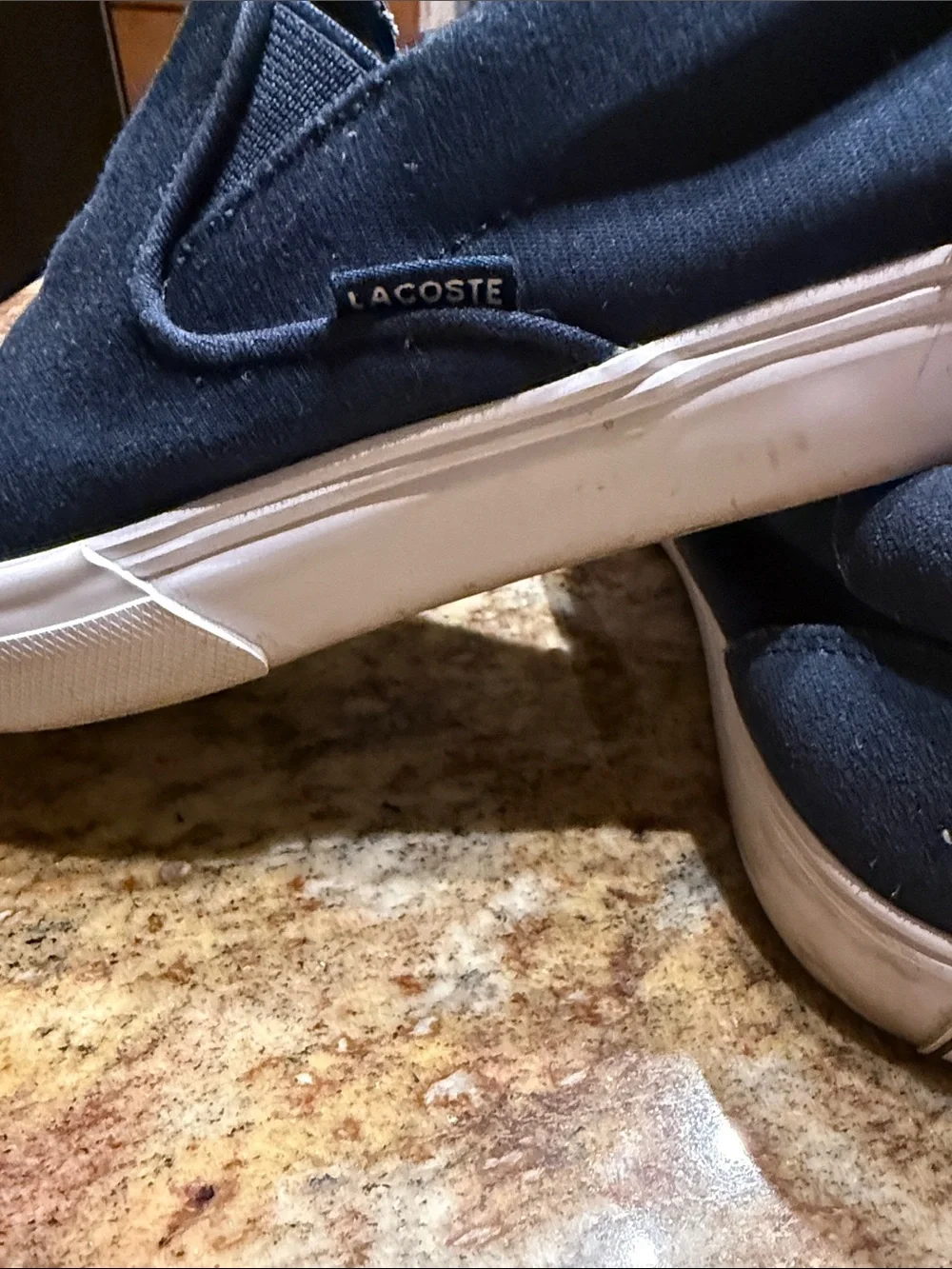 Lacoste Men's Slip-On Sneakers in Navy and White